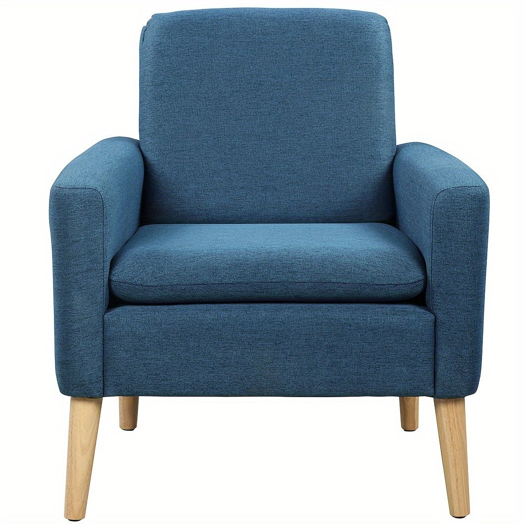 Fotel tapicerowany z drewnianymi nogami i wąskimi podłokietnikami