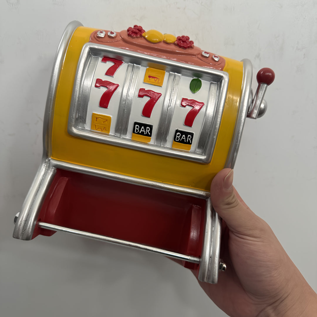 Uchwyt na papier toaletowy Jackpot – Design automatu do gry, montowany na ścianie