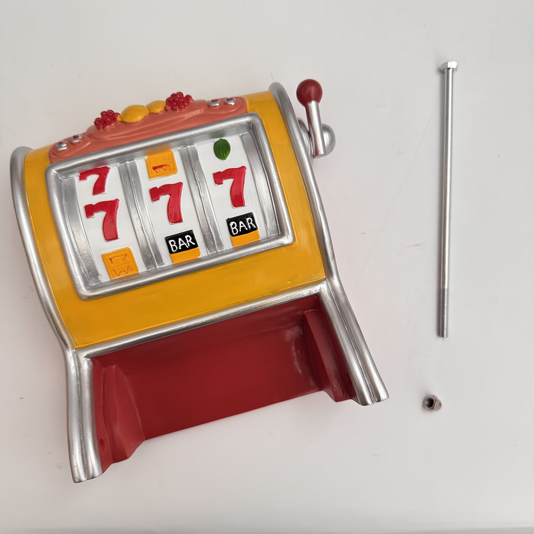 Uchwyt na papier toaletowy Jackpot – Design automatu do gry, montowany na ścianie