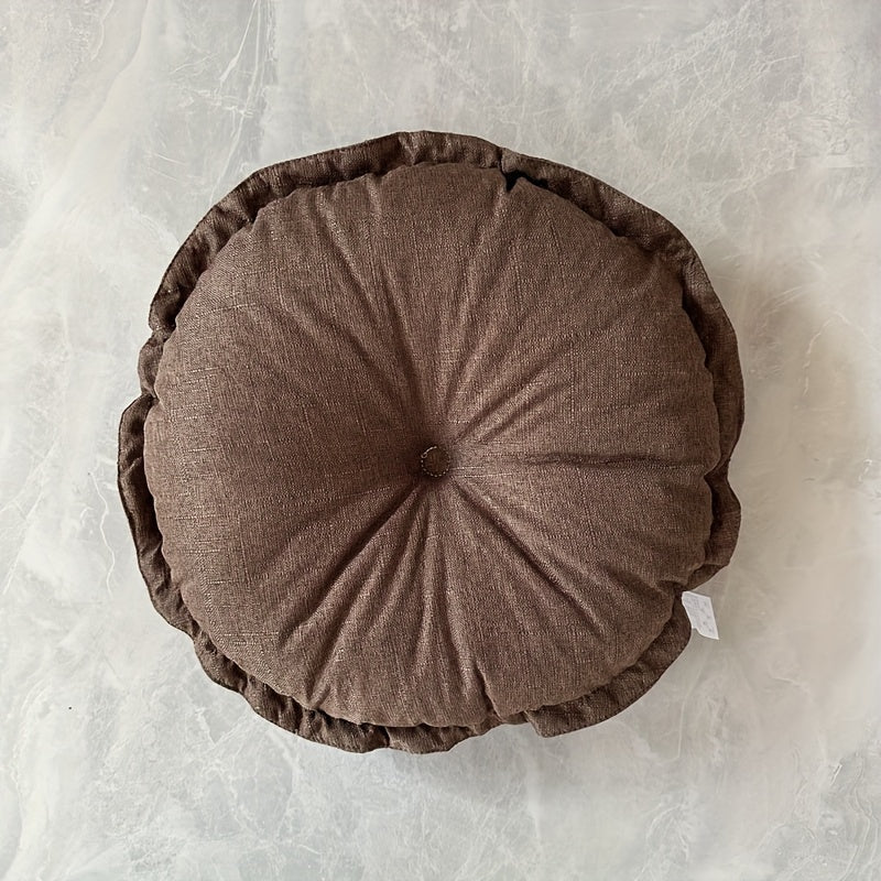 Puf okrągły z marszczeniem i centralnym guzikiem