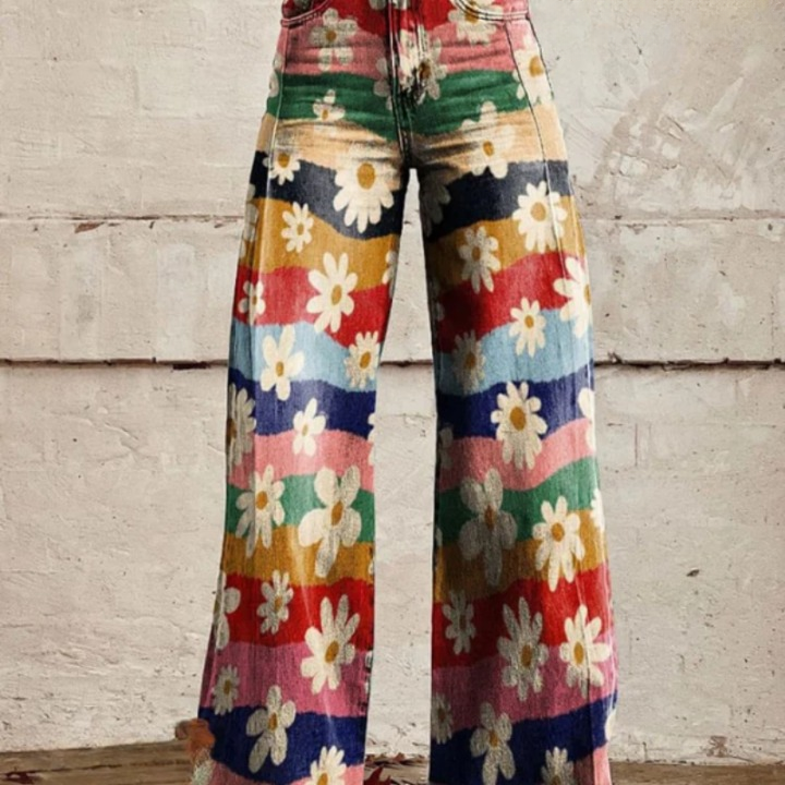 Modne retro spodnie z rozkloszowanymi nogawkami w kwiaty i wysokim stanem - Mirella