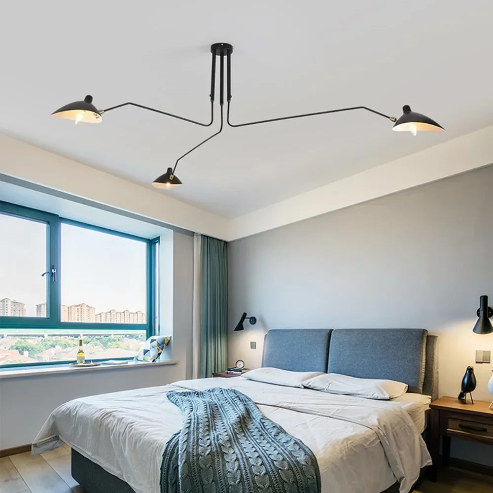 Czarna lampa sufitowa z obrotowymi ramionami – nowoczesny design