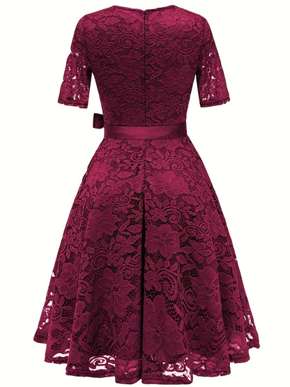 Sukienka damska midi z ażurowym wzorem i pasem wiązanym w talii