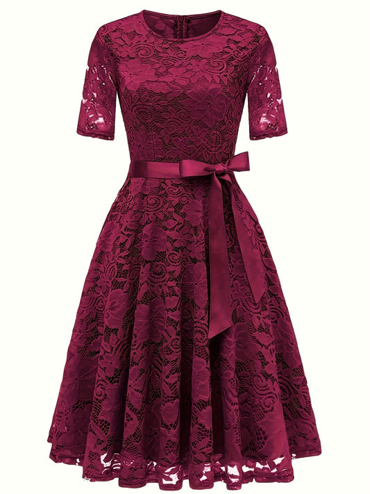 Sukienka damska midi z ażurowym wzorem i pasem wiązanym w talii