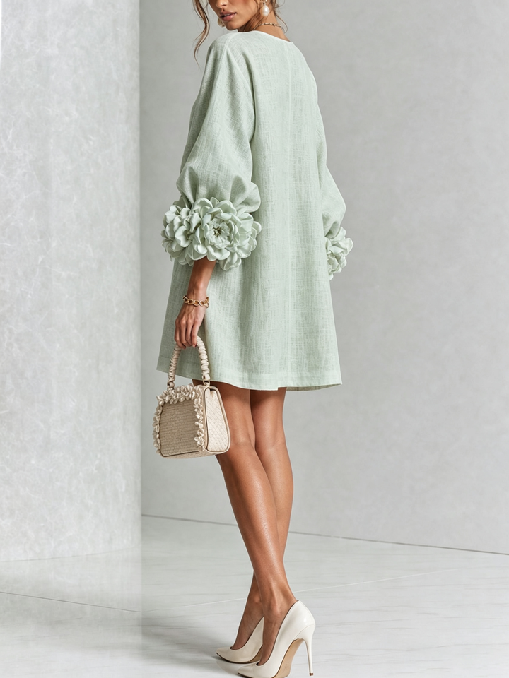 Sukienka koszulowa z mieszanki lnu z rozetami przy rękawach.