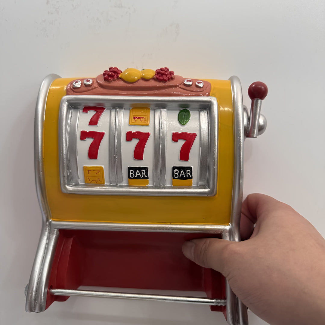 Uchwyt na papier toaletowy Jackpot – Design automatu do gry, montowany na ścianie