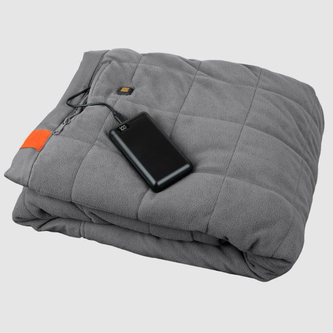 Ogrzewany koc outdoorowy z wbudowanym powerbankiem i 3 strefami