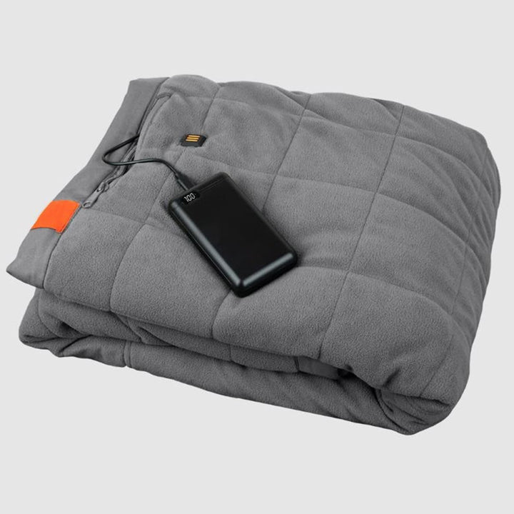 Ogrzewany koc outdoorowy z wbudowanym powerbankiem i 3 strefami
