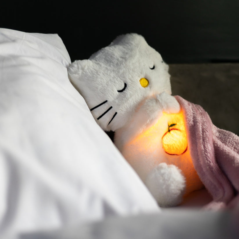 Relaksujący pluszak z symulacją oddechu i światłem nocnym - kojący