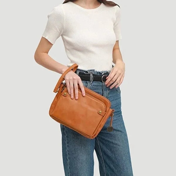 Elegancka torebka crossbody ze skóry - wyrafinowanie i przestrzeń